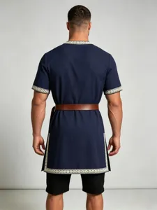 Detailed back view of medieval men tunic featuring embroidered trim and brown leather belt.