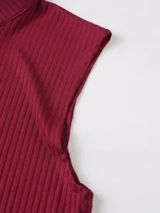 Close-up detail of men's ribbed knit sleeveless tank top in burgundy, casual fitness wear.