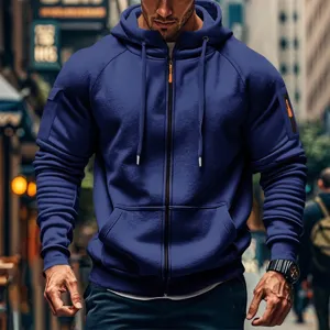 Men's casual zip-up hooded sweatshirt detail showing sleeve pocket and textured fabric.