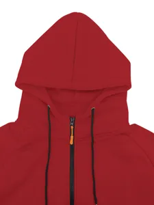 Red zip-up hoodie detail view featuring black drawstrings and a bright orange zipper pull.