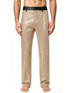 Detail view of men's shiny gold sequin trousers, featuring fine craftsmanship and black waistband.