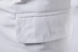 Gros plan sur le tissu et les details de la poche de veste de costume homme article