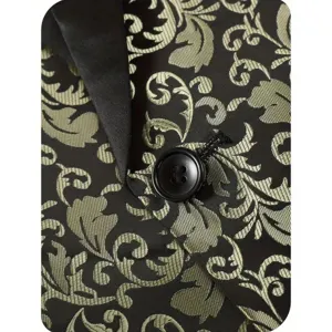 Men's floral brocade suit jacket detail featuring black and gold damask pattern and satin lapel.