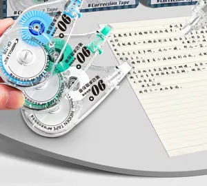 Close-up detail of portable student correction tape showing 90-degree rotating hidden tape design.
