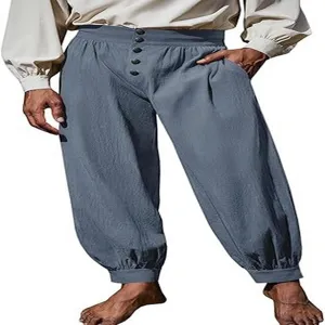 Detail view of the medieval renaissance loose linen pirate pants with buttoned waist design.