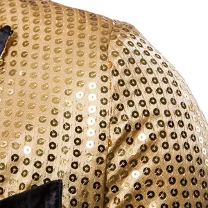 Men's sequin suit jacket detail showing dense gold sequins and black lapel fabric texture.