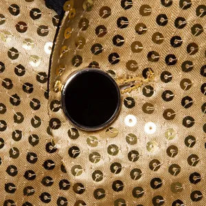 Close-up detail of luxury gold sequin fabric with black button and lapel collar for men suit.