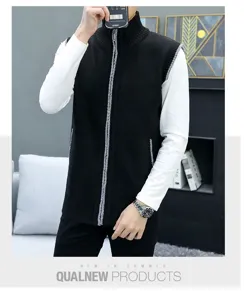 Detail view of men's black knit vest, featuring stand collar and front zipper design.