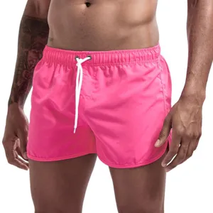 Short de bain rose unicolore pour homme avec cordon blanc de plage et loisirs d'ete