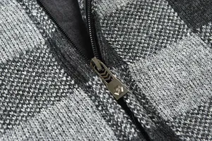 Men's thick fleece zip cardigan sweater detail, grey plaid knit fabric with metal zipper.