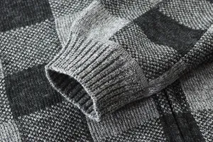 Detailed view of men winter thermal fleece lined plaid knitted cardigan sleeve cuff texture.