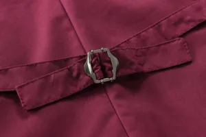 Close-up detail shot of men suit vest back adjustable strap and metal buckle, wine red fabric