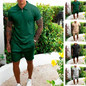 Detailed view of men's summer solid color short sleeve polo shirt and shorts casual sportswear set.