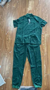 Detail shot of mens dark green casual half-zip short sleeve tracksuit top and pants set