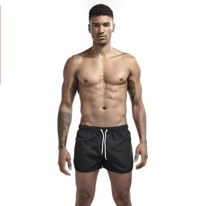 Pantaloncini da mare estivi neri da uomo tinta unita con coulisse bianca regolabile