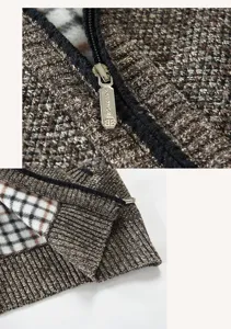 Detailaufnahme von Reißverschluss und Karo-Futter einer gefütterten Herren Strickweste.