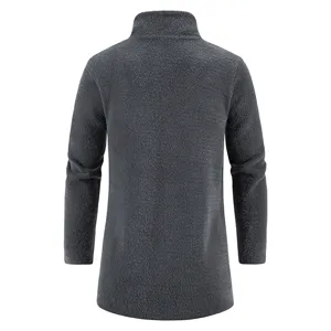 Detail view of the dark gray fleece turtleneck sweater, showing the back texture and long sleeves.