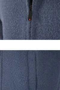 Detail view of men's fuzzy knit cardigan zipper and plush fabric texture