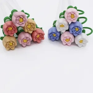 Detailed close-up showing vibrant silicone 3D rose straw toppers in multiple colors with clear straws.