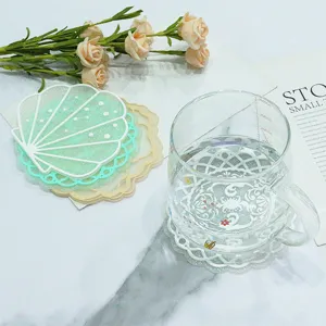 Glitter shell and lace cup coasters set, waterproof heat-resistant PVC table mats for home.