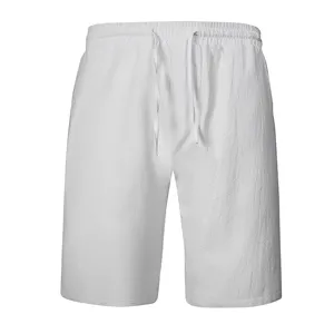 Close-up view of casual men cotton linen shorts texture, soft breathable summer beach wear.