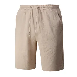 Detail view of men's casual cotton linen beach shorts, elastic drawstring waist and pockets.