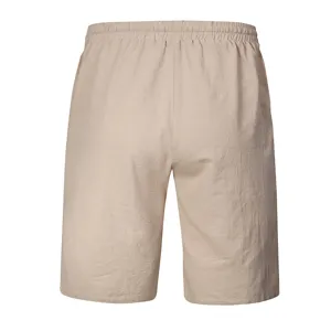 Casual solid color cotton linen men beach shorts back view detail, elastic waist design.