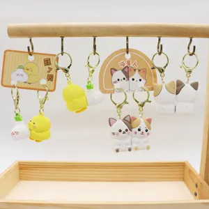 Cute cat and duck magnetic couple keychains, PVC cartoon bag charms, ideal gifts for friends.