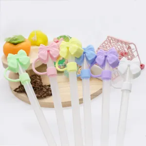 Cute silicone straw covers with bow design, dust-proof tumbler straw toppers for cups.