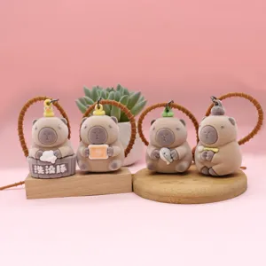Cute flocked capybara keychain creative animal bag pendant couple car key ring charm.