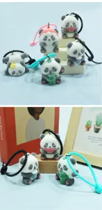 Flocked panda keychain detail, cute plush bag pendant showcasing fine texture and adorable poses.
