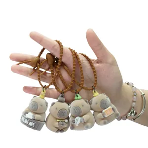 Cute flocked capybara keychains set with brown ropes, creative bag pendant and car key rings.