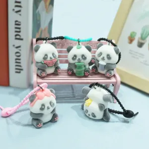 Cute flocked panda keychains set, miniature cartoon animal bag charms and car keychain pendants.