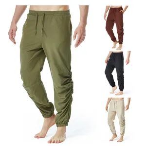 Pantalón casual de lino para hombre con cordón en la cintura elástica y diseño liso.