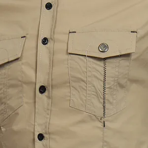 Men's casual work shirt detail, khaki long sleeve tactical cargo pocket close-up view.