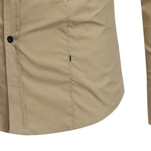 Men's casual long sleeve shirt fabric detail view, khaki cotton workwear stitching.