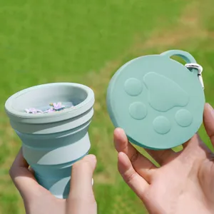 Portable 180ml silicone collapsible water cup with cute cat paw lid, perfect for travel outdoor.