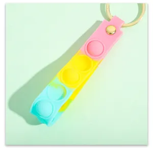 Colorful silicone push pop bubble sensory keychain detail, cute stress relief toy pendant for bag.