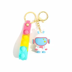 Cartoon space rabbit astronaut keychain cute PVC 3D doll bag charm pendant main view.