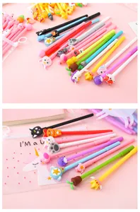 Cute cartoon gel pen set with adorable silicone toppers and transparent storage bag.