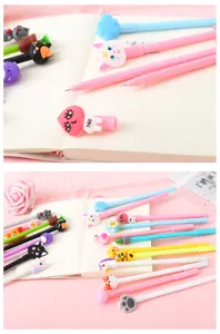 Cute cartoon gel pen set with adorable silicone animal and magic wand toppers, smooth black ink.