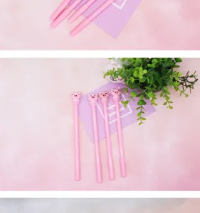 Cute cartoon pig gel pen detail shot, pink aesthetic student black ink signature stationery.