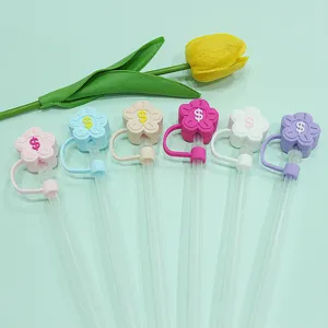 Colorful flower silicone dustproof straw covers with 10mm reusable straws, flat lay main view.