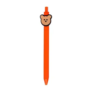 Cute orange gel pen featuring a cute cartoon bear clip, smooth black ink stationery.