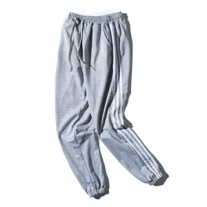 Pantalon de jogging gris pour homme casual sweatpants stylé avec taille ajustable.