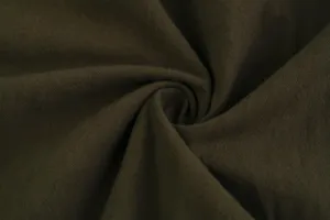 Dark green cotton linen fabric detail shot for men's casual drawstring trousers close up.