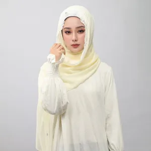Detailed view of the elegant women chiffon hijab with delicate lace trim close up view