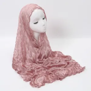 Pink crinkled Tencel long scarf with delicate lace edge, elegant women's hijab shawl.