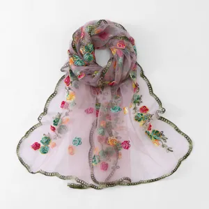 Exquisite floral embroidered sheer scarf detail, lightweight purple chiffon fabric trim.