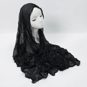 Detailed view of the black crinkled lightweight long scarf showcasing its unique texture.